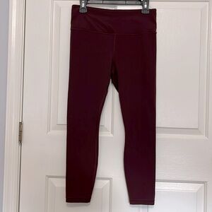 Women’s Athleta Elation 7/8 Tight. Size “M” dark burgundy. Excellent condition